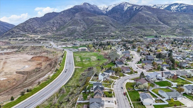 aerial view featuring a mountain view and a residential view
