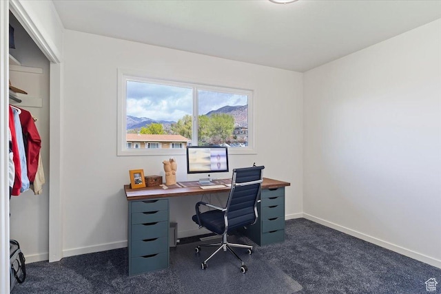 3315 Meadow Dr, Ogden, UT 84403 - office area featuring dark colored carpet and baseboards