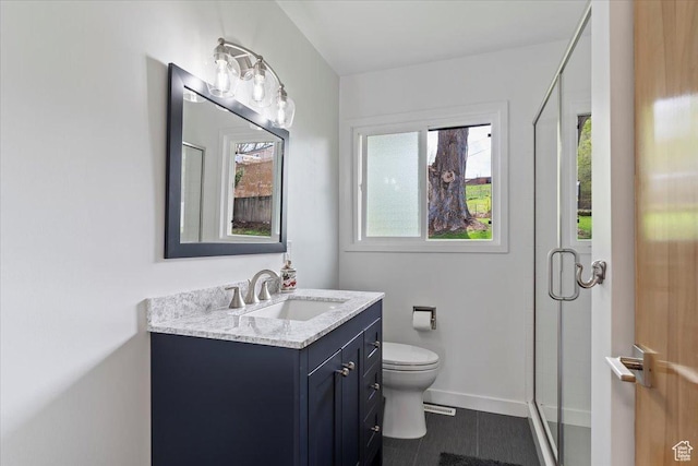 3315 Meadow Dr, Ogden, UT 84403 - bathroom featuring tile patterned floors, a stall shower, toilet, baseboards, and vanity