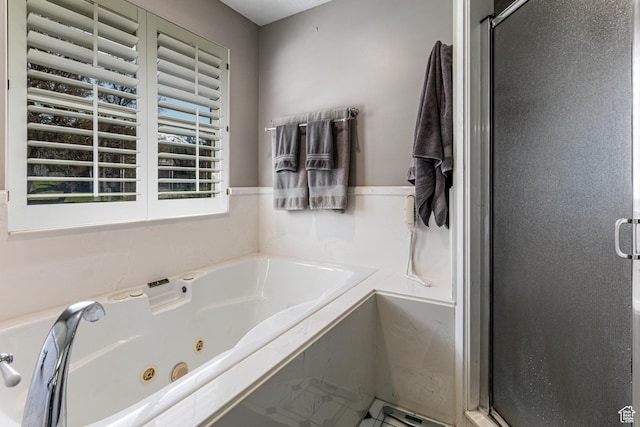 637 S Pine Meadow Ln, Tooele, UT 84074 - full bathroom featuring a shower stall and a jetted tub