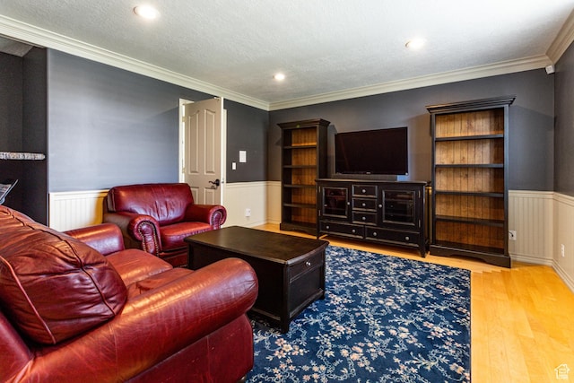 637 S Pine Meadow Ln, Tooele, UT 84074 - living area with recessed lighting, wood finished floors, ornamental molding, and wainscoting