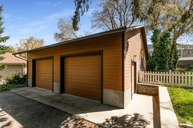 637 S Pine Meadow Ln, Tooele, UT 84074 - detached garage with fence