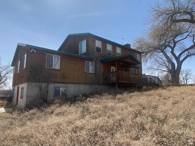 7413 W 7250 S, Myton, UT 84052 - view of property exterior with a wooden deck