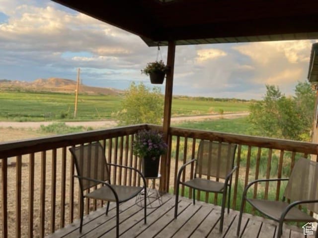 7413 W 7250 S, Myton, UT 84052 - wooden terrace featuring a view of countryside