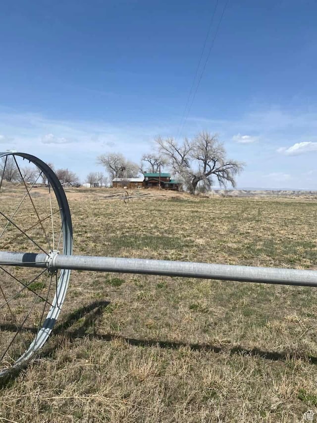 7413 W 7250 S, Myton, UT 84052 - view of yard featuring fence and a rural view