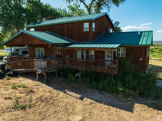 7413 W 7250 S, Myton, UT 84052 - view of front of house featuring a standing seam roof and a metal roof