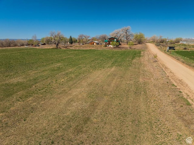7413 W 7250 S, Myton, UT 84052 - view of yard featuring a rural view and dirt driveway