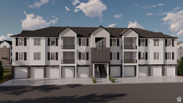 4735 S Alder Ln Unit F202, Mapleton, UT 84664 - view of front of house with a garage and driveway