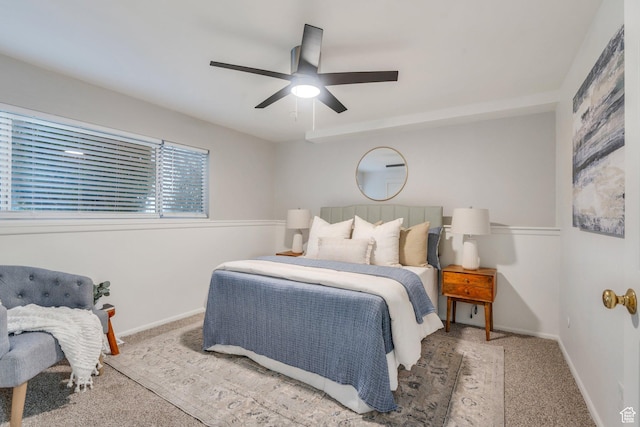 bedroom with baseboards, carpet, and ceiling fan
