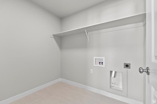 6622 W Spring Snow Ln, Herriman, UT 84096 - laundry area with electric dryer hookup, washer hookup, baseboards, and light tile patterned flooring