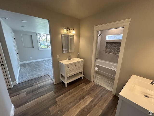 337 W Paddock Ln S, Kaysville, UT 84037 - full bath with vanity, wood finished floors, toilet, bathing tub / shower combination, and baseboards