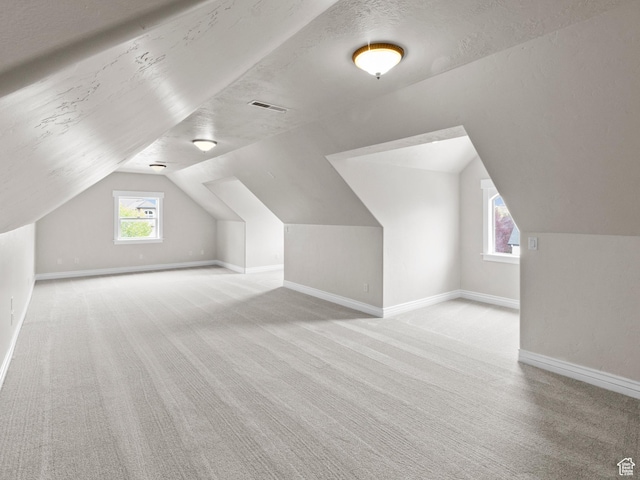 337 W Paddock Ln S, Kaysville, UT 84037 - bonus room featuring carpet floors, baseboards, vaulted ceiling, and visible vents