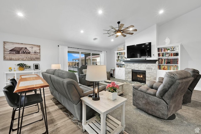 4990 W 12000 N, Tremonton, UT 84337 - living area featuring recessed lighting, lofted ceiling, wood finished floors, a ceiling fan, and a fireplace