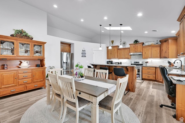 4990 W 12000 N, Tremonton, UT 84337 - dining area featuring vaulted ceiling, visible vents, recessed lighting, and light wood-style floors