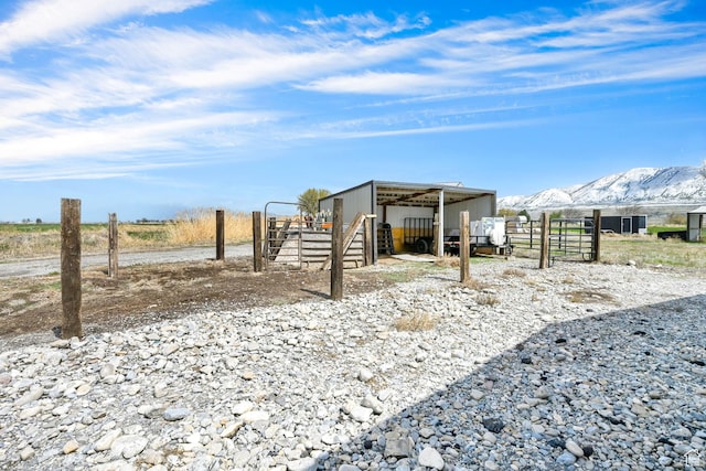 4990 W 12000 N, Tremonton, UT 84337 - view of outbuilding with an outdoor structure, a mountain view, and an exterior structure