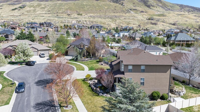 drone / aerial view featuring a mountain view and a residential view