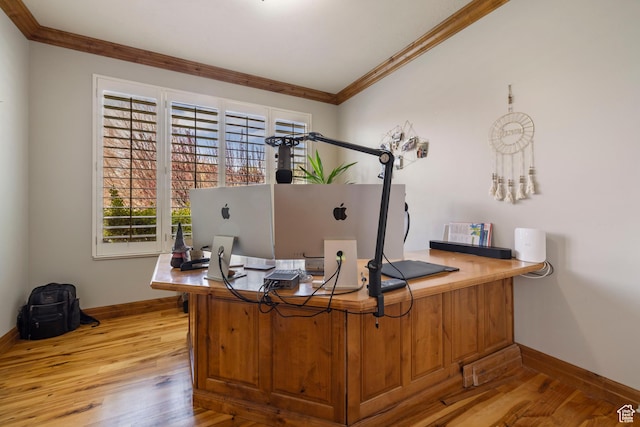 home office featuring light wood-type flooring, baseboards, and ornamental molding