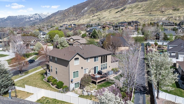 drone / aerial view with a mountain view and a residential view