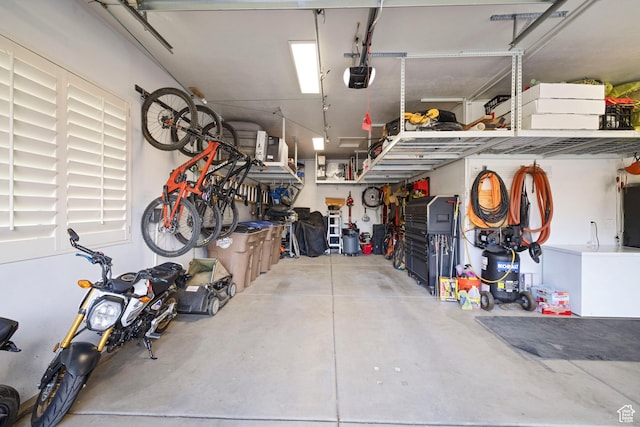 garage featuring a garage door opener