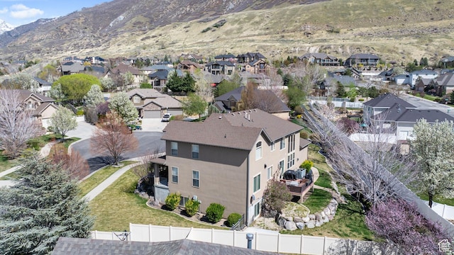 birds eye view of property with a residential view and a mountain view