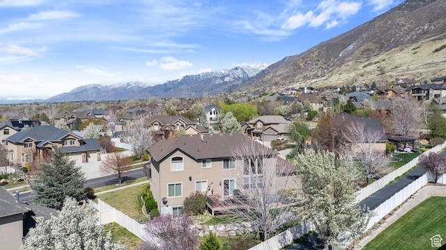 aerial view with a mountain view and a residential view