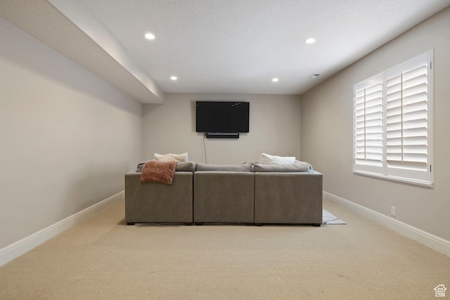 living area with recessed lighting, carpet flooring, and baseboards