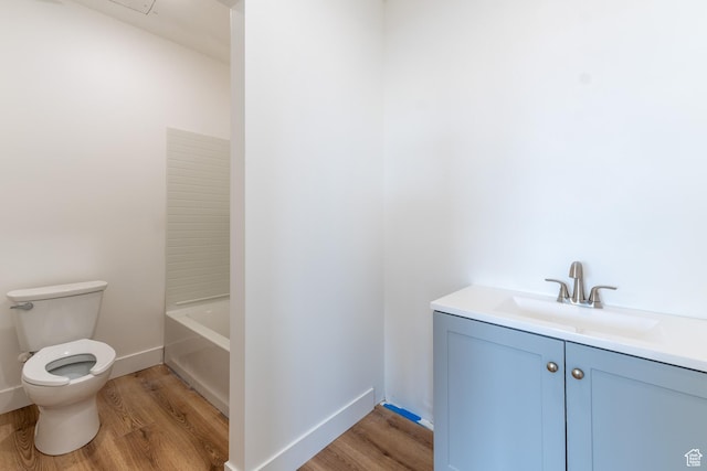 1993 S 5000 W, Taylor, UT 84401 - bathroom featuring toilet, vanity, wood finished floors, and baseboards