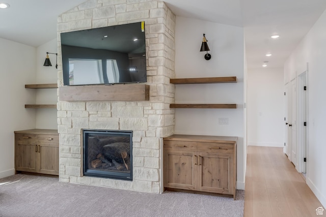 1993 S 5000 W, Taylor, UT 84401 - unfurnished living room with baseboards, a stone fireplace, light wood finished floors, and recessed lighting