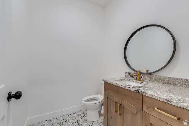 1993 S 5000 W, Taylor, UT 84401 - half bath with baseboards, vanity, tile patterned floors, and toilet