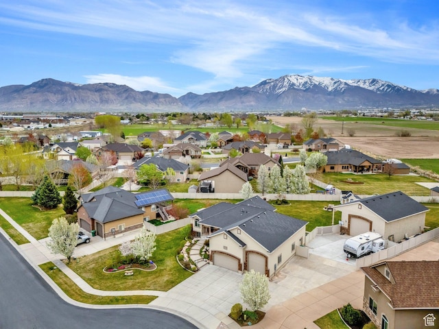 drone / aerial view featuring a mountain view and a residential view