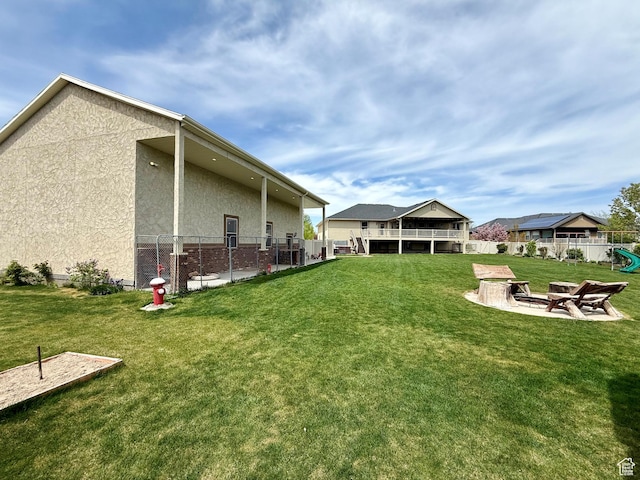 view of yard featuring a patio and fence