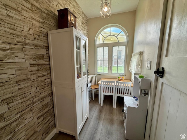 doorway featuring wood finished floors