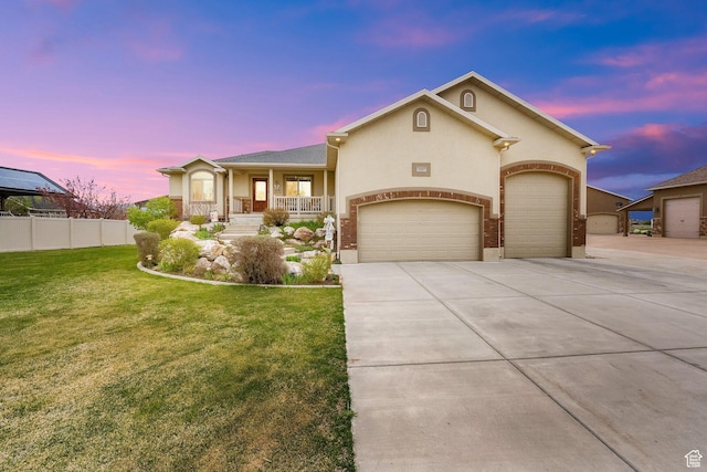 view of front of house featuring a porch, a front yard, a garage, driveway, and fence