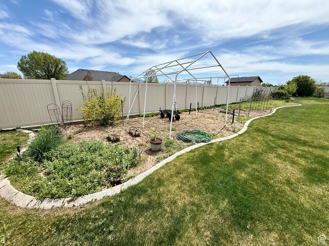 view of yard featuring fence
