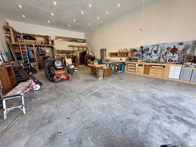 garage with a workshop area