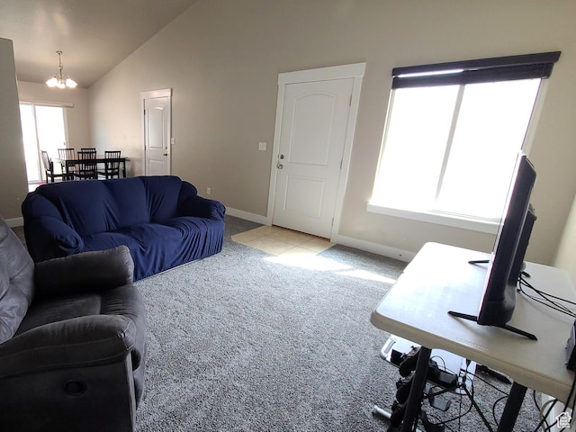 living area with lofted ceiling, light carpet, baseboards, and a chandelier