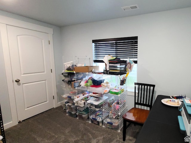office area featuring visible vents and carpet