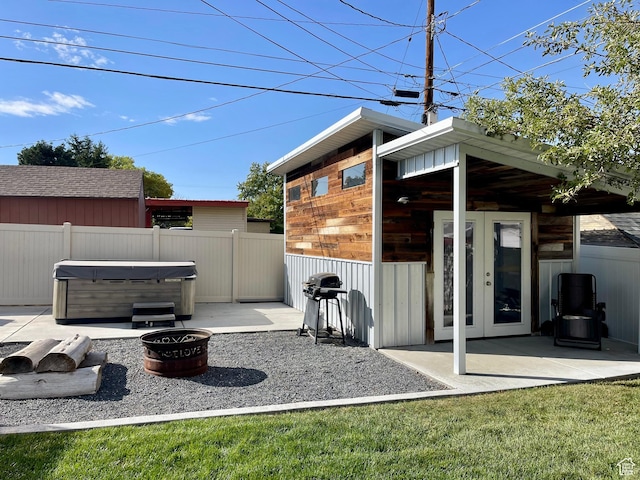 715 Oak Dr, Brigham City, UT 84302 - view of patio / terrace with area for grilling, fence, a hot tub, and french doors