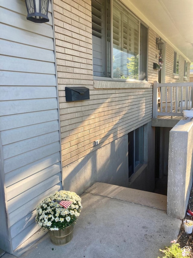 715 Oak Dr, Brigham City, UT 84302 - view of side of property featuring covered porch