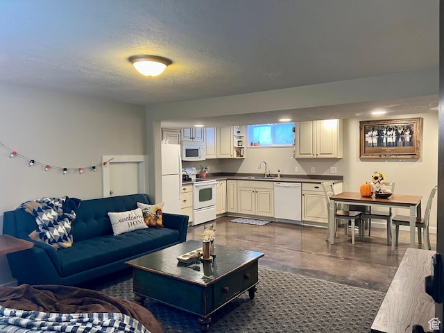 715 Oak Dr, Brigham City, UT 84302 - living area with concrete floors and a textured ceiling