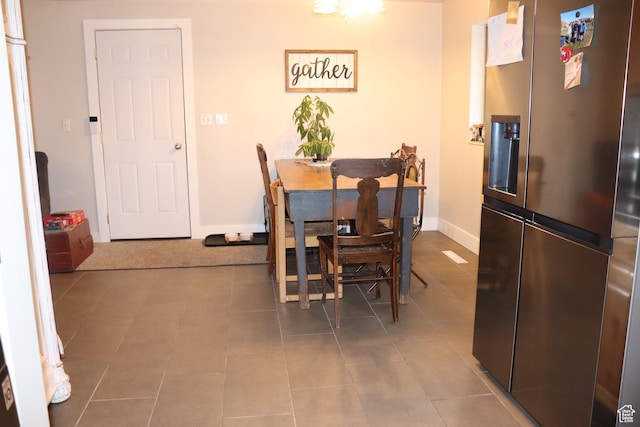 715 Oak Dr, Brigham City, UT 84302 - tiled dining area featuring baseboards