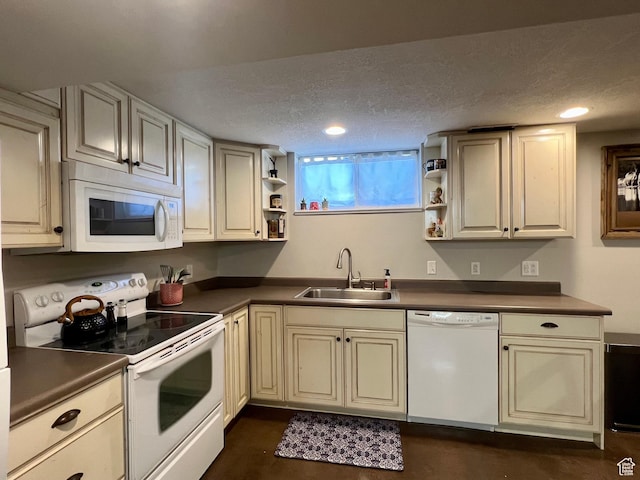 715 Oak Dr, Brigham City, UT 84302 - kitchen featuring a sink, dark countertops, white appliances, open shelves, and cream cabinets