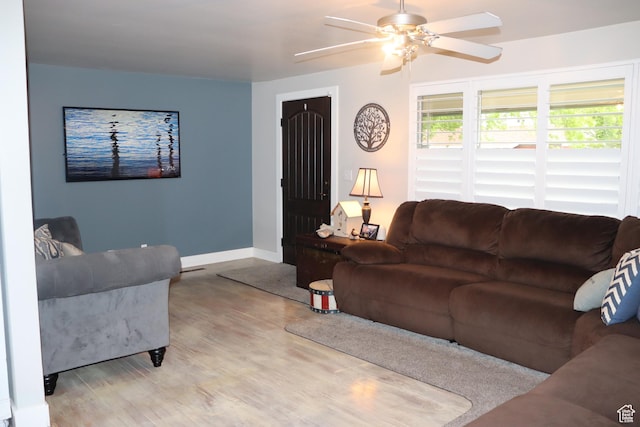 715 Oak Dr, Brigham City, UT 84302 - living area featuring a ceiling fan, baseboards, and light wood-style floors