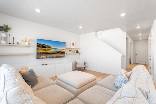 543 W Flora Dr, Saratoga Springs, UT 84045 - living room with recessed lighting, light wood-type flooring, baseboards, and stairs