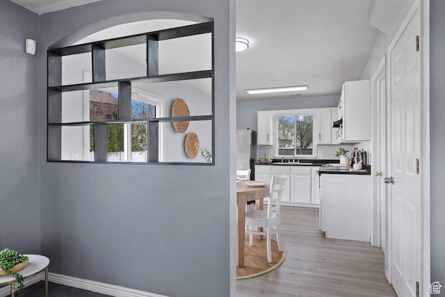718 N 410 W, Tooele, UT 84074 - hall with light wood-type flooring