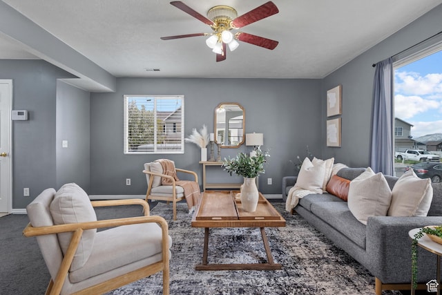 718 N 410 W, Tooele, UT 84074 - living room with a ceiling fan and baseboards