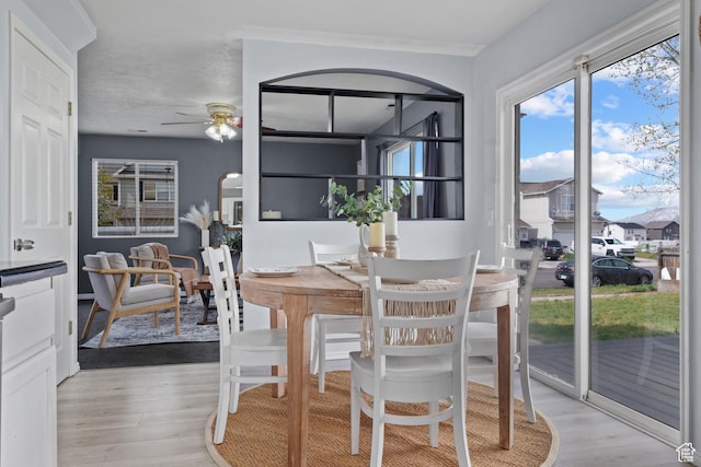 718 N 410 W, Tooele, UT 84074 - dining room with a ceiling fan and light wood-style flooring