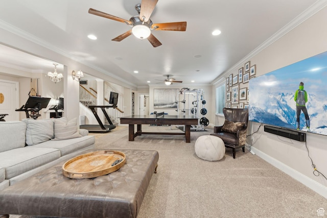 carpeted living area with recessed lighting, crown molding, and a ceiling fan