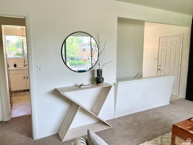 394 E Bridlewood Dr S, Salt Lake City, UT 84107 - hallway with a sink, an upstairs landing, and light colored carpet