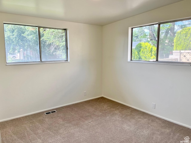 394 E Bridlewood Dr S, Salt Lake City, UT 84107 - spare room with carpet floors, visible vents, and baseboards